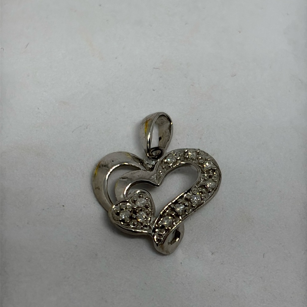 10 KT white gold 0.07 CT diamonds heart with a pave heart pendant